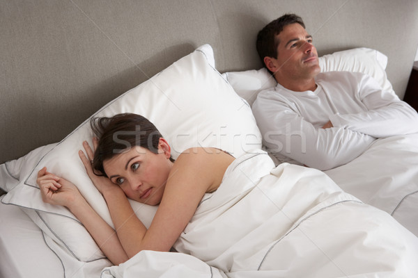 Casal problemas desacordo cama mulher comunicação Foto stock © monkey_business