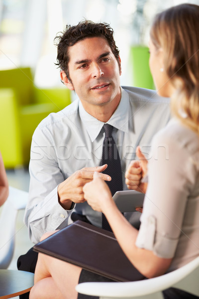 Businesspeople With Digital Tablet Having Meeting In Office Stock photo © monkey_business