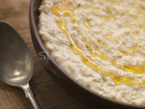 Bowl of Porridge with Golden Syrup Stock photo © monkey_business