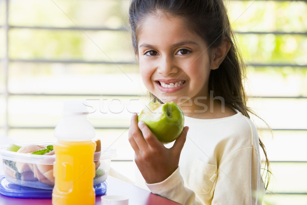 Girl eating lunch at kindergarten  Stock photo © monkey_business