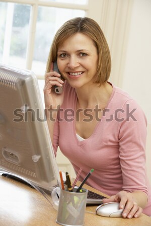 Young Girl Using Computer At Home Stock photo © monkey_business