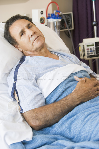 Mann Krankenhausbett medizinischen Bett krank Farbe Stock foto © monkey_business