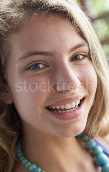 Portré tinilány mosolyog lány gyerekek tini Stock fotó © monkey_business
