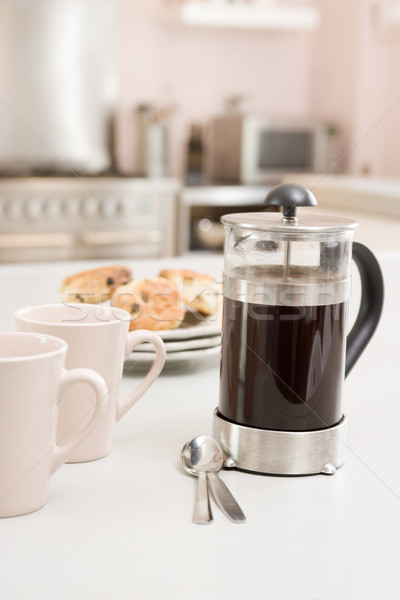 Coffee pot on kitchen counter with scones Stock photo © monkey_business