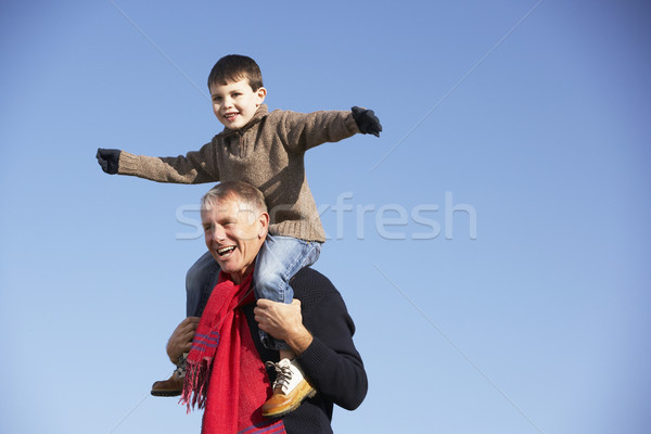 Grandfather Carrying Grandson On His Shoulders Stock photo © monkey_business