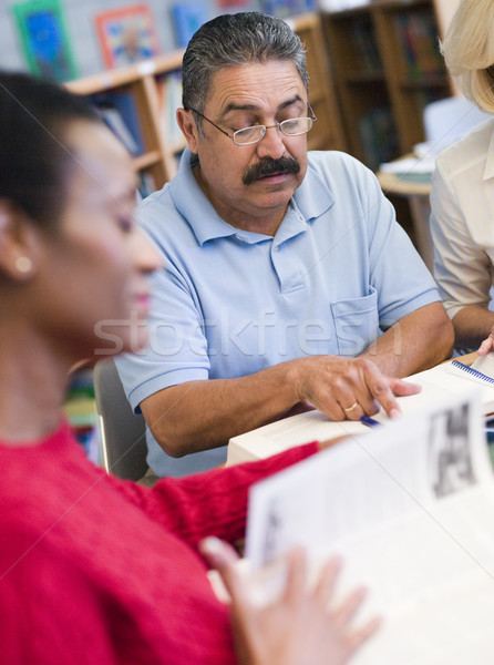 Mature students studying in library Stock photo © monkey_business