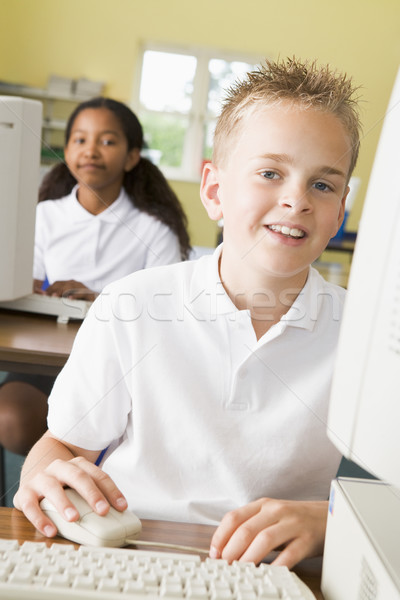 Scolaro studiare scuola computer bambino tastiera Foto d'archivio © monkey_business
