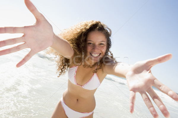 Nő megnyugtató tengerpart visel bikini boldog Stock fotó © monkey_business