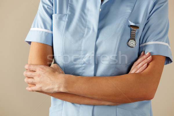 UK nurse standing with arms folded Stock photo © monkey_business