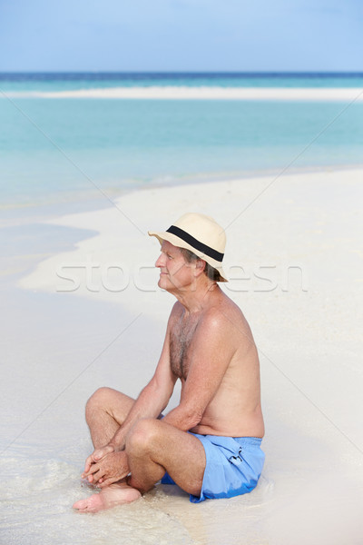 Senior Man Enjoying Beach Holiday Stock photo © monkey_business