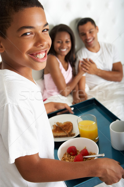 Son Bringing Parents Breakfast In Bed Stock photo © monkey_business