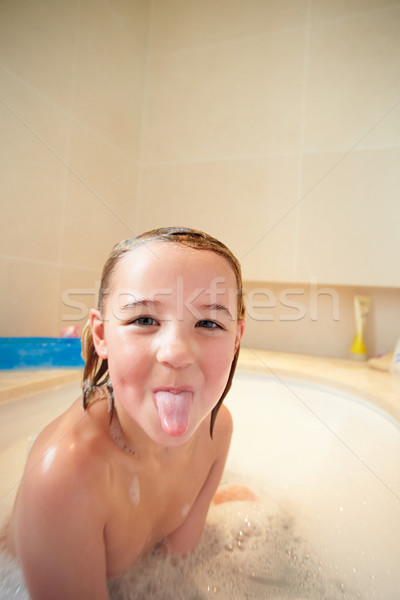 Girl In Bath Sticking Out Tongue Stock photo © monkey_business