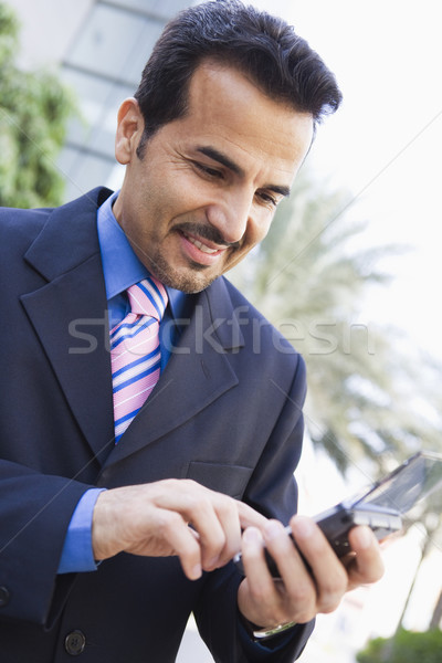 Zakenman pda buiten man technologie persoon Stockfoto © monkey_business