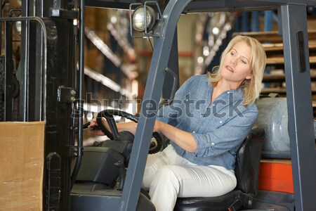 Magazijn werknemer heftruck gelukkig werk vrachtwagen Stockfoto © monkey_business