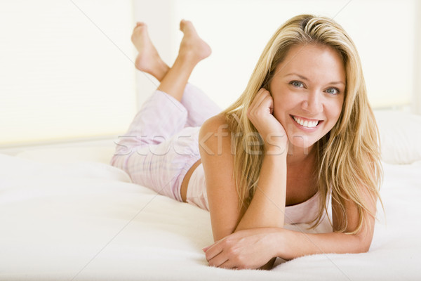 Frau Schlafzimmer lächelnde Frau lächelnd Frauen glücklich Stock foto © monkey_business