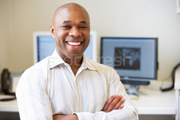 Portrait Of Male Obstetrician In Hospital Stock photo © monkey_business
