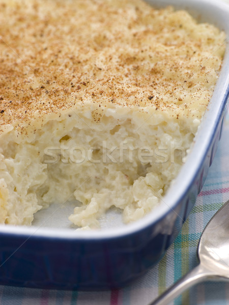 Plato arroz con leche nuez moscada postre cuchara crema Foto stock © monkey_business