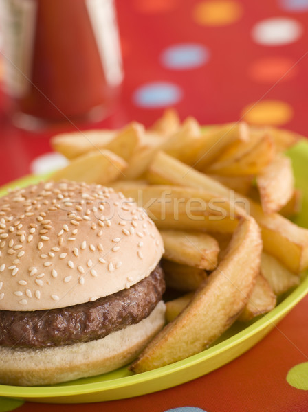 Beefburger in a Sesame Seed Bun with Chunky Chips Stock photo © monkey_business