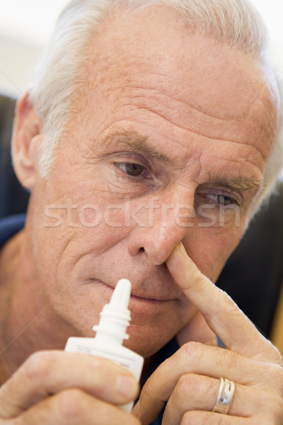 Senior Man Using Nasal Spray Stock photo © monkey_business