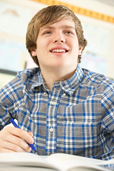 Maschio adolescente studente studiare classe felice Foto d'archivio © monkey_business