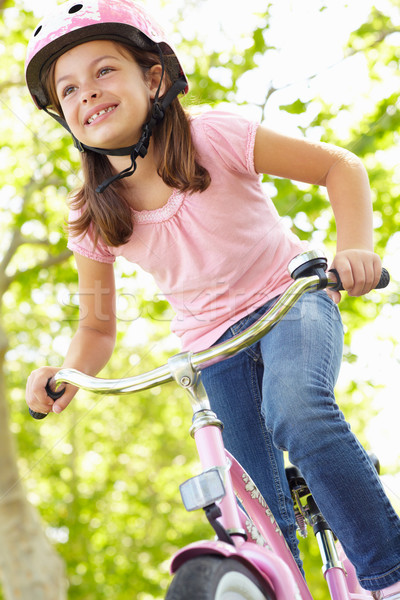 Girl riding bike Stock photo © monkey_business