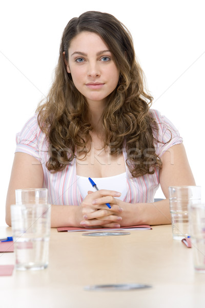 Empresária sessão sala de reuniões mulher tabela retrato Foto stock © monkey_business