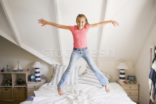 прыжки кровать девушки ребенка домой Сток-фото © monkey_business