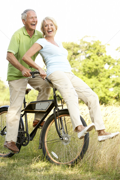 Reifen Paar Reiten Fahrrad Landschaft Frau Stock foto © monkey_business