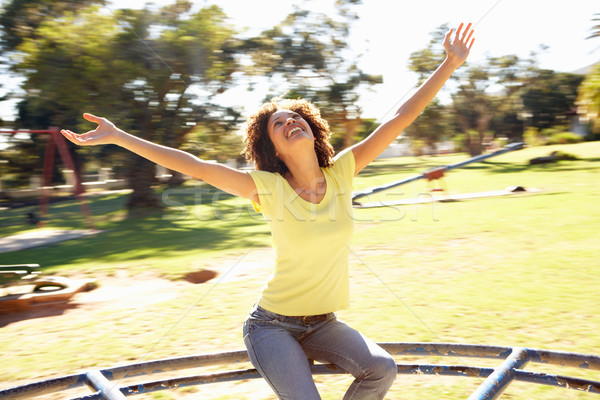 Stockfoto: Jonge · vrouw · paardrijden · rotonde · park · vrouw · persoon