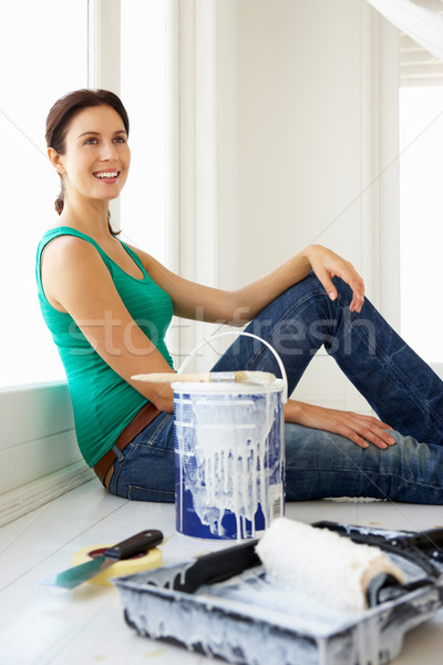 Woman decorating house Stock photo © monkey_business