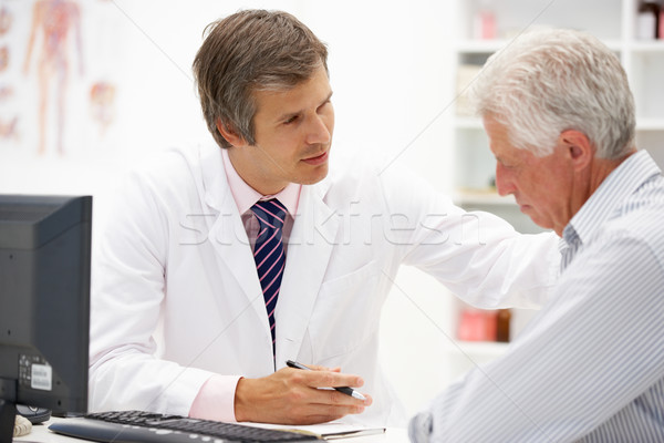 Doctor with senior patient Stock photo © monkey_business