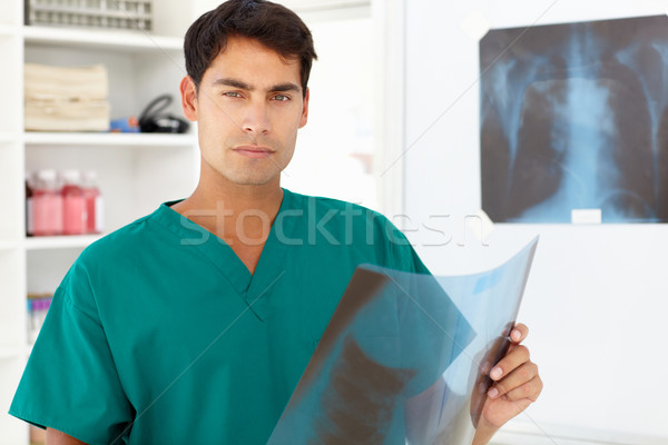 Young male doctor with x-ray Stock photo © monkey_business