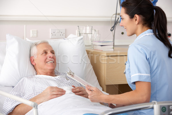 Stock photo: Nurse and male patient in UK Accident and Emergency