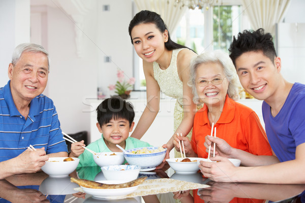Portrait Of Multi-Generation Chinese Family Eating Meal Together Stock photo © monkey_business
