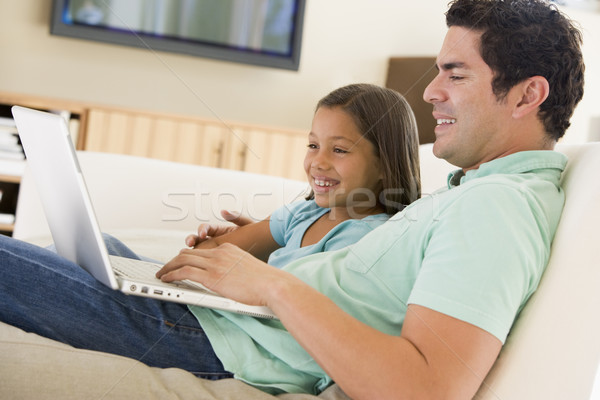 Stock foto: Mann · junge · Mädchen · Wohnzimmer · Laptop · lächelnd · Computer