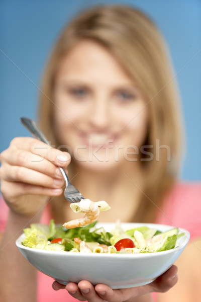 Tinilány tart tál saláta tini tányér Stock fotó © monkey_business