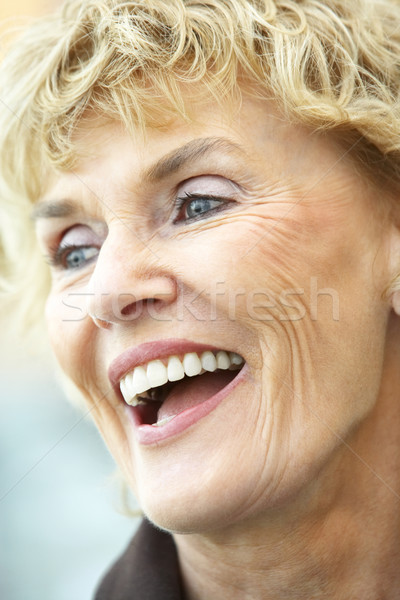 Stock photo: Portrait Of Senior Woman Laughing