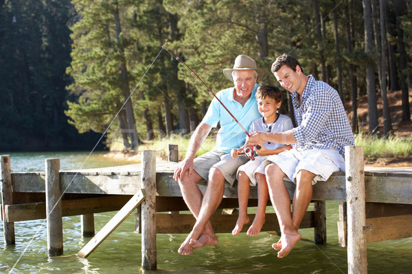 Nieto pesca junto hombre feliz sol Foto stock © monkey_business