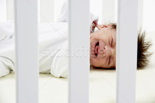 Newborn Baby Crying In Cot Stock photo © monkey_business