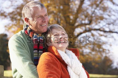 Stock photo: Grandfather And Granddaughter Blowing Bubbles On Family Picnic