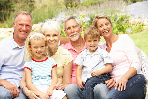 Extended Family Relaxing In Garden Stock photo © monkey_business