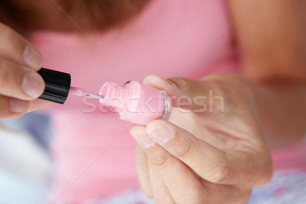 Close up detail teenage girl painting nails Stock photo © monkey_business