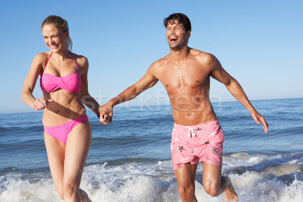 Couple Enjoying Beach Holiday Stock photo © monkey_business