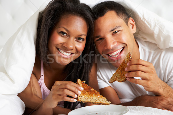 Couple Enjoying Breakfast In Bed Stock photo © monkey_business