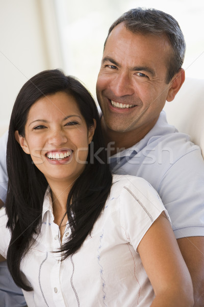 カップル リビングルーム 笑みを浮かべて 女性 男 幸せ ストックフォト © monkey_business