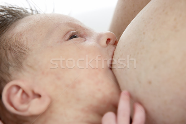 Stock photo: Mother Breastfeeding Baby