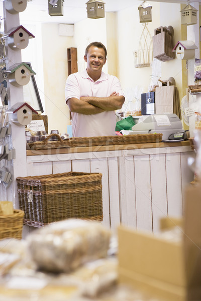 Man in birdhouse store smiling Stock photo © monkey_business