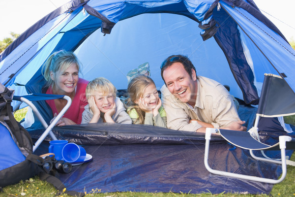 Family camping in tent smiling Stock photo © monkey_business