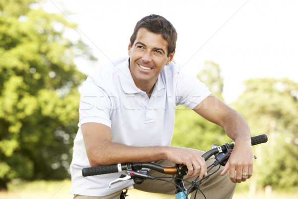 Foto stock: Moço · equitação · bicicleta · sorrir · retrato