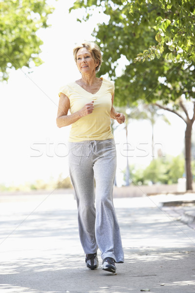 Photo stock: Supérieurs · femme · jogging · parc · heureux · courir